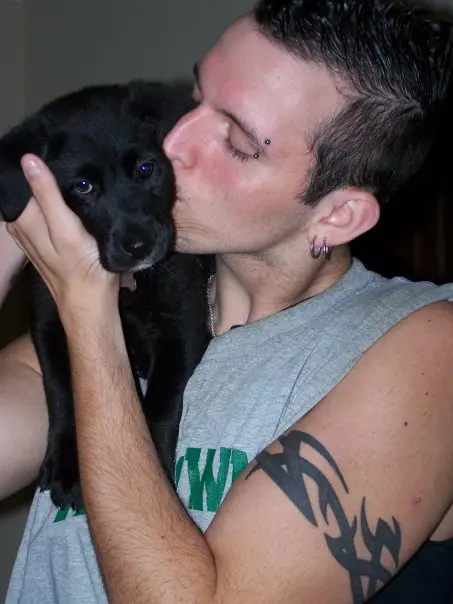 Jon Palacio with a dog